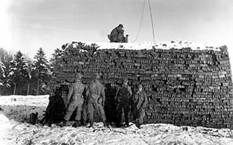 Pathfinders of the 101st Airborne Division parachuting into Bastogne, December 1944
